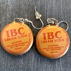 Pair of IBC cream soda bottle cap earrings